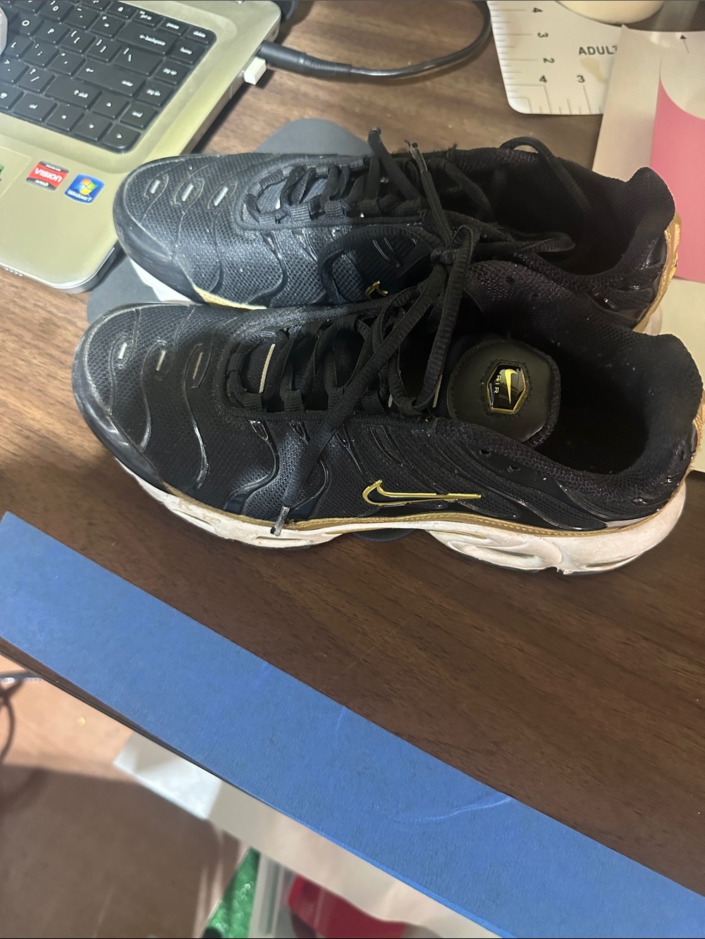 Nike Black and Gold Low-Top Trainers
